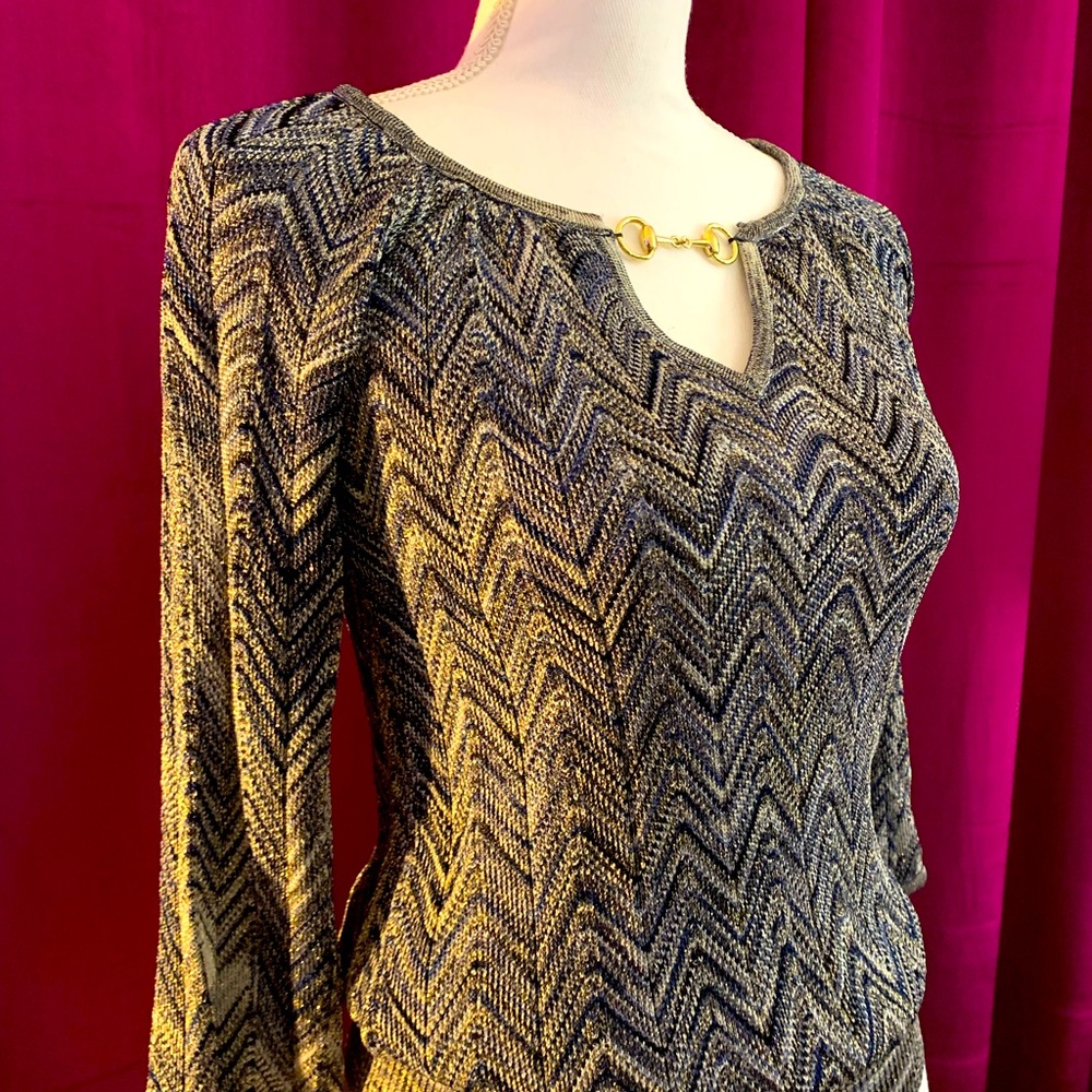 Size S INC top. Used once. Stretchy fabric, very beautiful 3 quarter length slv.